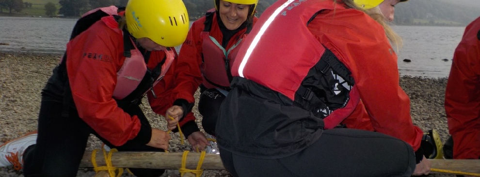knot tying on a raft build session Lake District